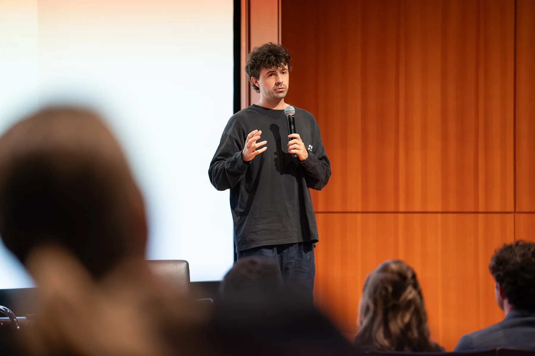 Liam Bolling speaking to an audience at Google